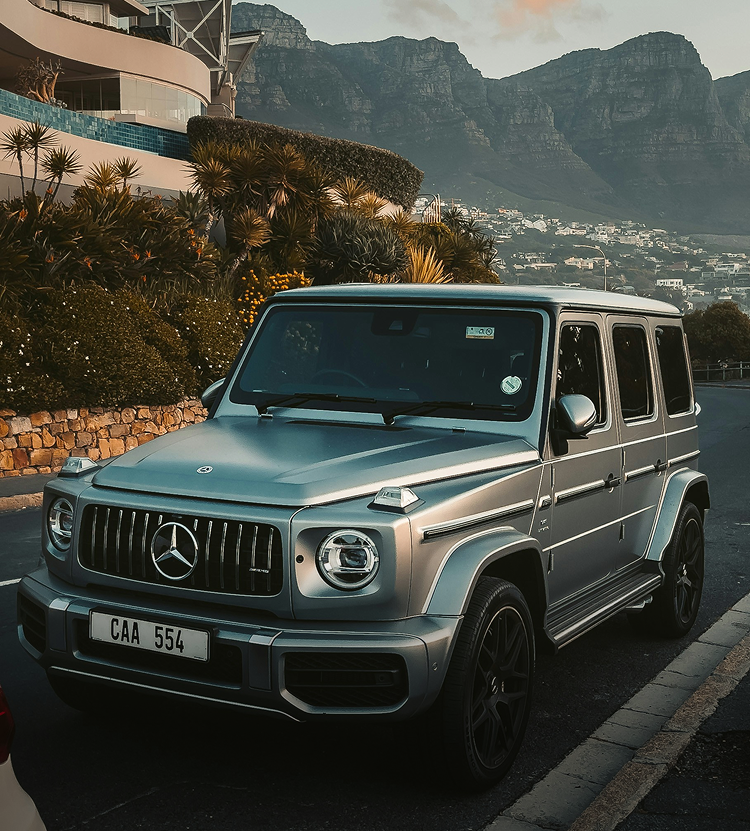 Silver Mercedes G Wagon on Road (1)